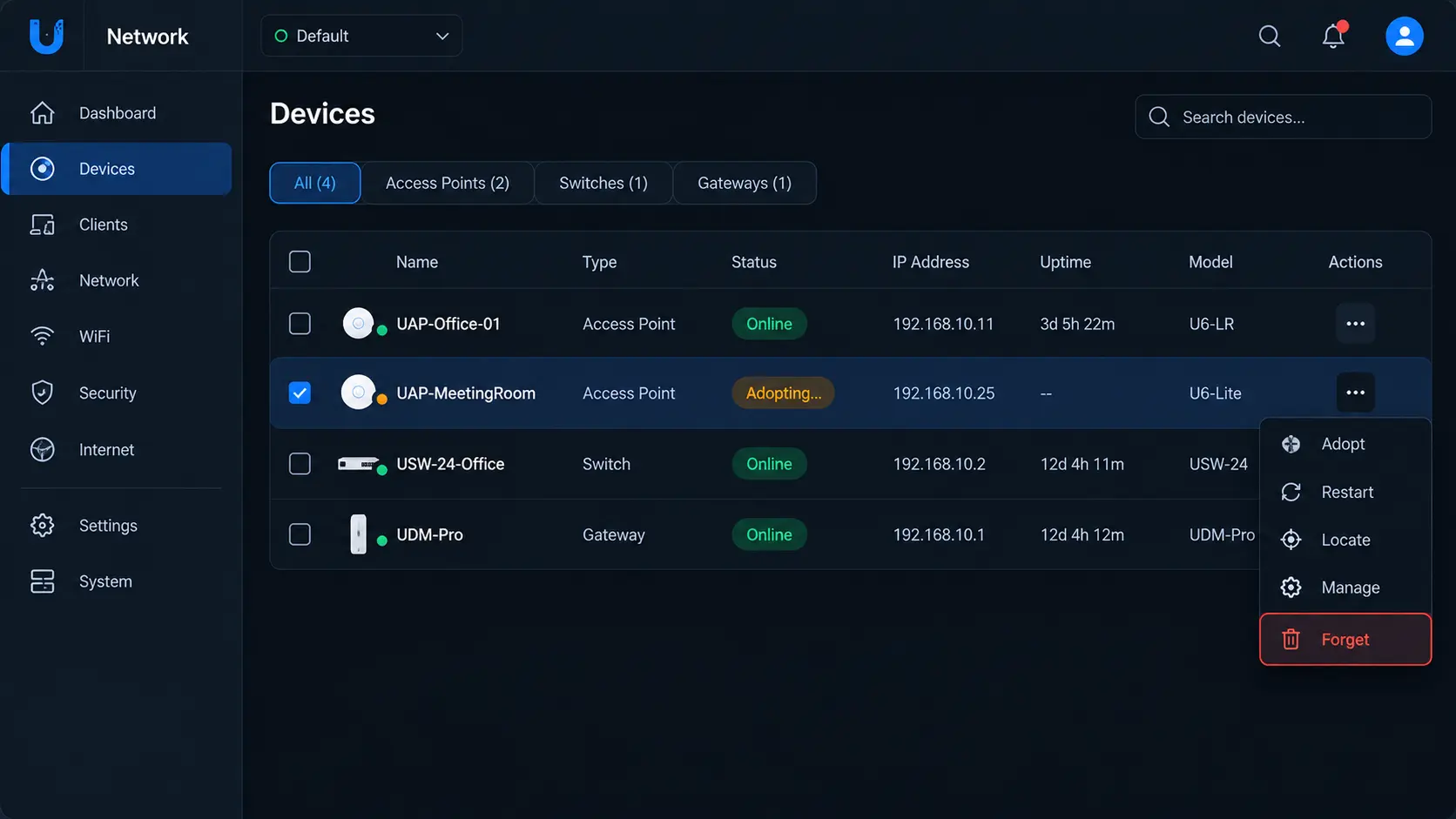 UniFi Controller Windows Server: Backup, Update & Troubleshooting 3 Dashboard UniFi Devices menampilkan access point dengan status Adopting stuck dan tombol Forget untuk reset adoption